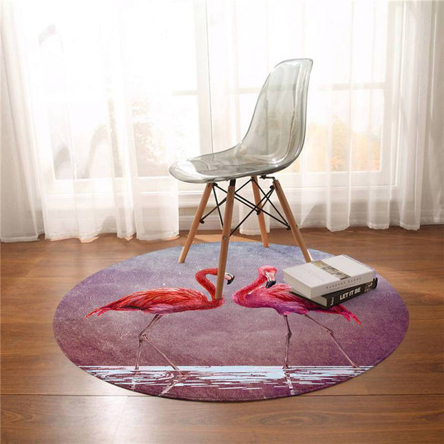 Rundt teppe med to flamingoer