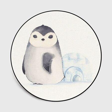 Rundt hvitt teppe med pingvinmotiv