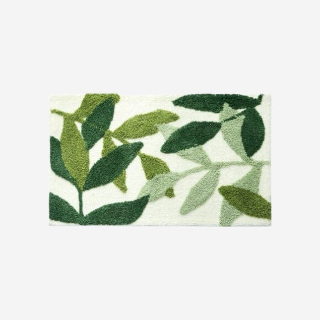 Dekorativ dørmatte med grønt bladmotiv