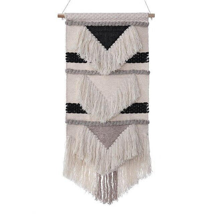 Stor geometrisk veggrye med frynser