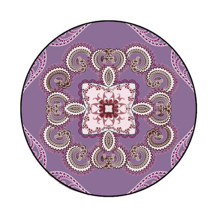 Stort rundt lilla teppe med mønster
