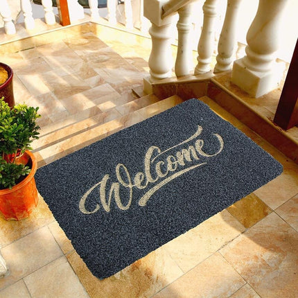 Sklisikker gummidørmatte med 'Welcome' tekst