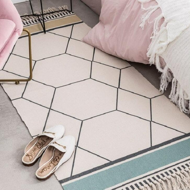 Lite designteppe med geometrisk mønster