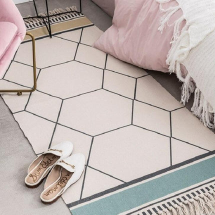 Lite designteppe med geometrisk mønster