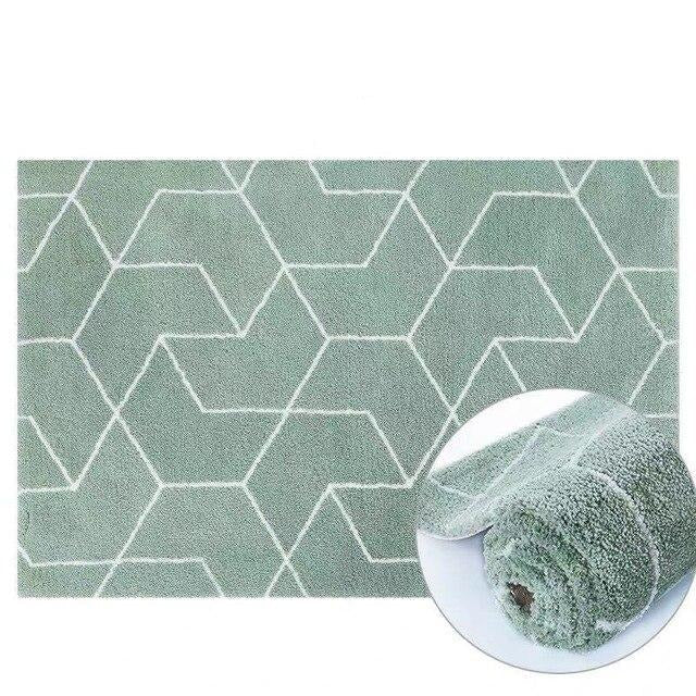 Sjøgrønt shaggy-teppe med geometrisk mønster