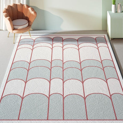 Blått og hvitt teppe med buemønster