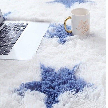 Blått og hvitt shaggy-teppe stjernemønster
