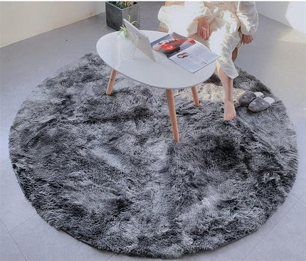 Mykt rundt mørkegrått shaggy-teppe