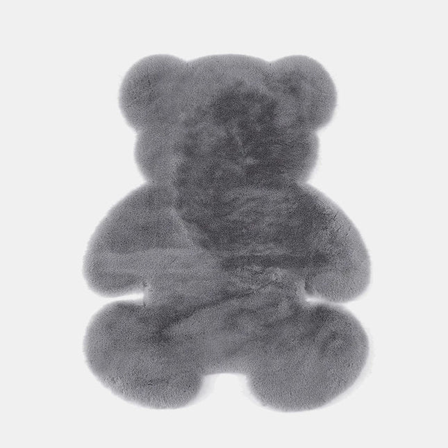Mykt mørkegrått teppe i bamseform