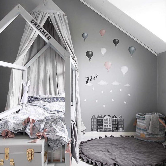 Rundt grått teppe for barnerom