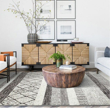 Grått og hvitt berberteppe for stue