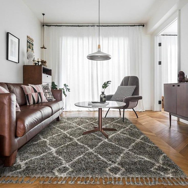 Mørkegrått berberteppe med høy luv