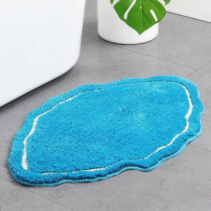 Myk lyseblå badematte til badet