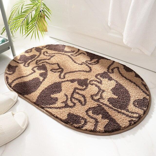 Brun oval badematte med kattemotiv