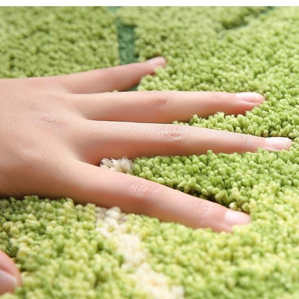 Myk badematte med bladmotiv