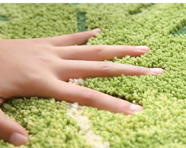 Myk badematte med bladmotiv