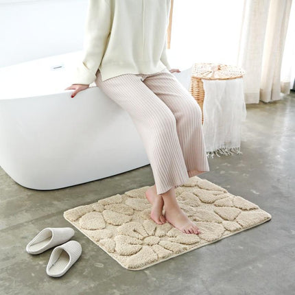 Badematte med preget blomsterdesign