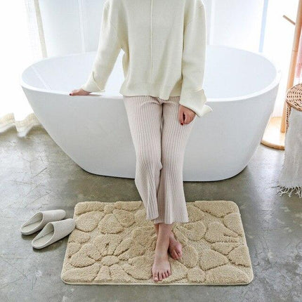 Badematte med preget blomsterdesign
