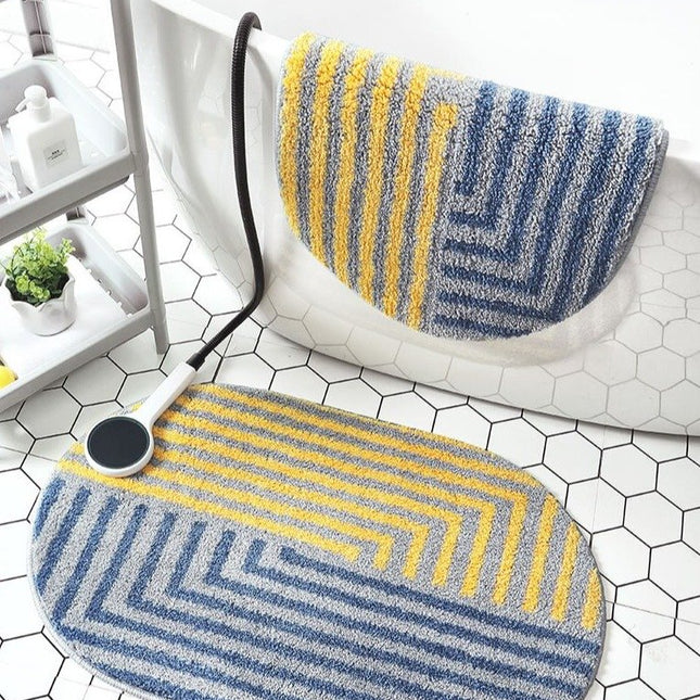 Oval badematte i gult og blått