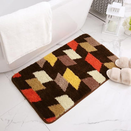 Mørkebrun badematte med geometrisk mønster