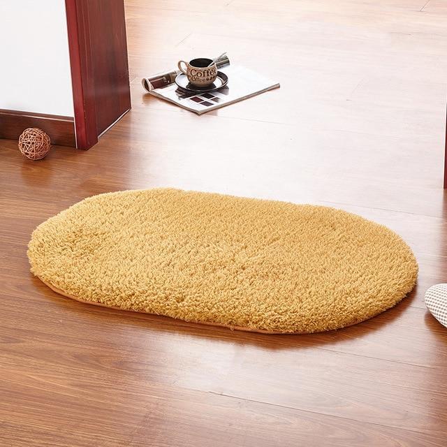 Myk oval oransje badematte