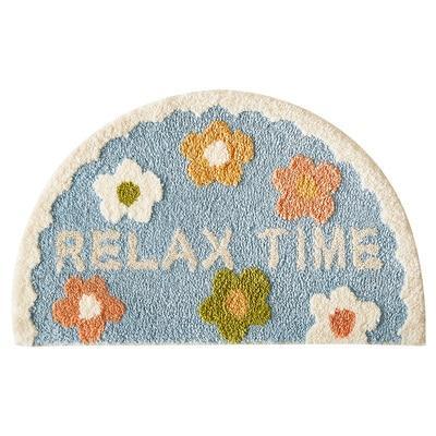 Avslappende badematte med blomstermotiv