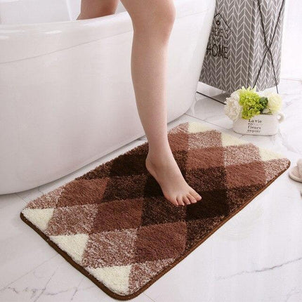 Absorberende brun badematte til badet