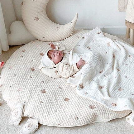 Rundt, vattert leketeppe for baby