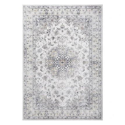 Teppe med elegant slitt vintage-effekt