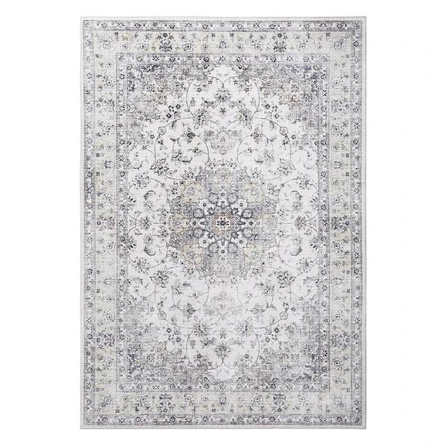 Teppe med elegant slitt vintage-effekt