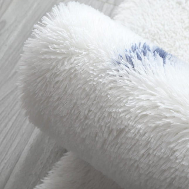 Blått shaggy teppe med stjerne