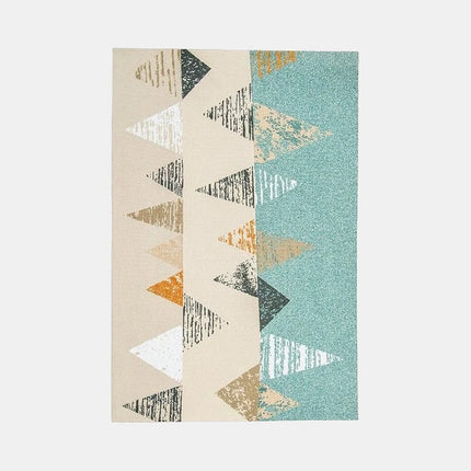 Fargerikt geometrisk teppe i skandinavisk stil