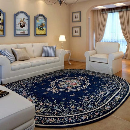 Ovalt teppe med blomstermotiv