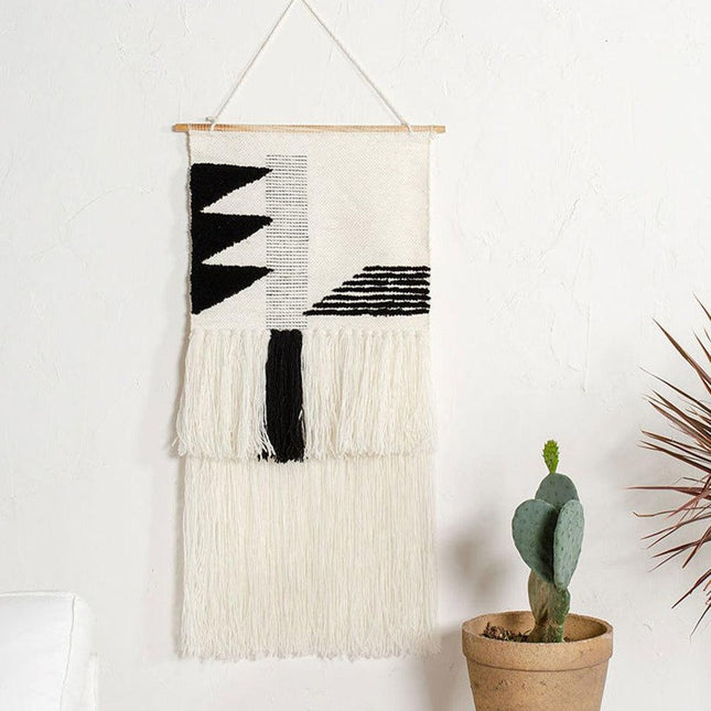 Hvit og svart geometrisk veggrye