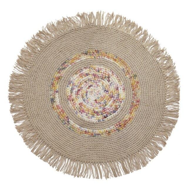 Rundt naturhvitt jute teppe med frynser