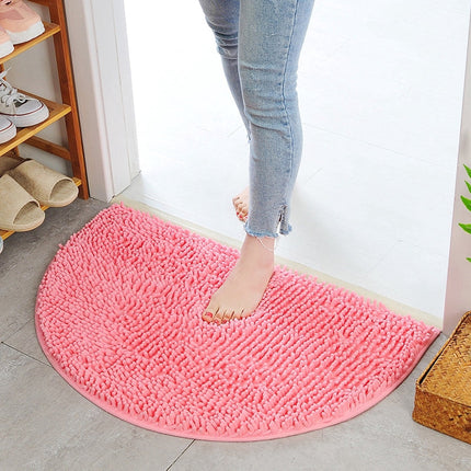 Halvmåneformet rosa badematte i mikrofiber