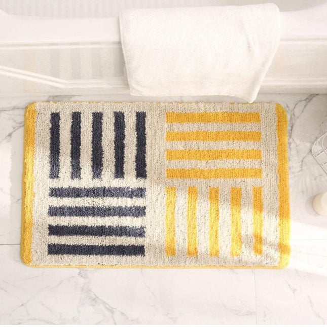 Myk gul baderomsmatte med striper