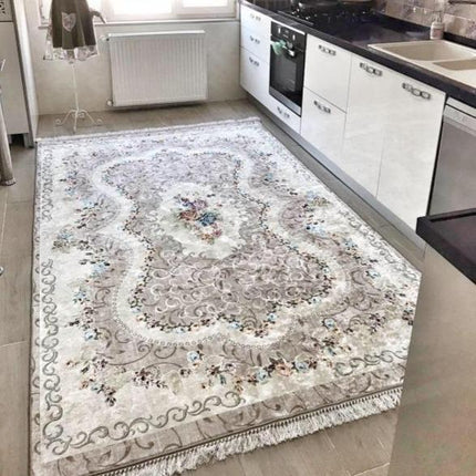 Grått teppe med klassisk vintagemønster