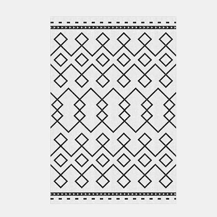 Skandinavisk geometrisk teppe i svart hvitt