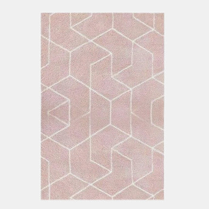 Puderrosa shaggy-teppe med geometrisk mønster