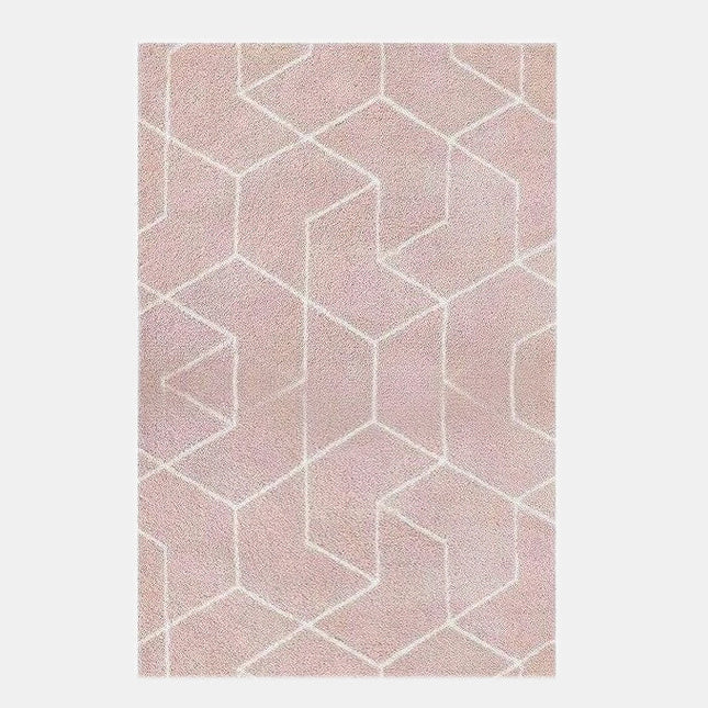Puderrosa shaggy-teppe med geometrisk mønster