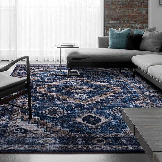 Blått vintage teppe med geometrisk mønster