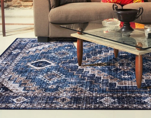 Blått vintage teppe med geometrisk mønster